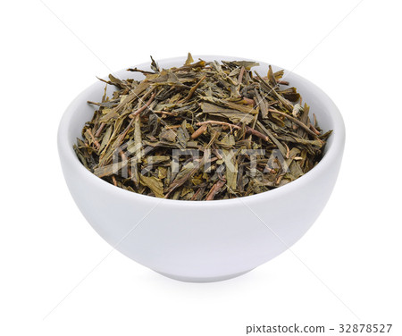 Dried green tea leaves on white background 32878527