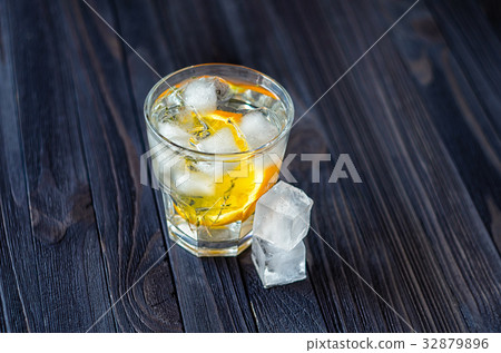 Lemonade with ice cubes and slice of orange Lemonade with ice cubes and slice of orange 32879896