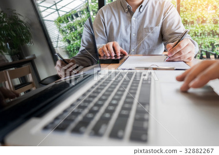 Business meeting in outdoor. documents account managers crew wo Business meeting in outdoor. documents account managers crew wo 32882267