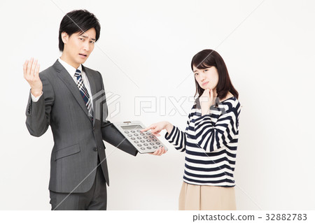 Businessman finance insurance calculator woman male Businessman finance insurance calculator woman male 32882783