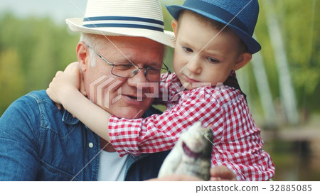 Portrait of smiling little boy with his first 32885085