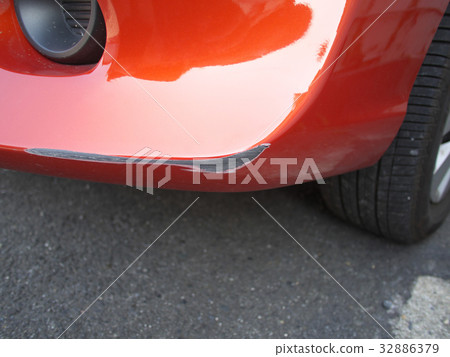 Scratches on the bumper wall of a car Scratches on the bumper wall of a car 32886379
