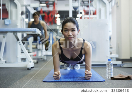 A portrait of a girl pressing up and looking ahead. A portrait of a girl pressing up and looking ahead. 32886458