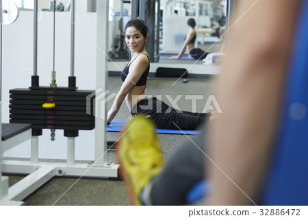 A trainee is extending and smiling at someone A trainee is extending and smiling at someone 32886472