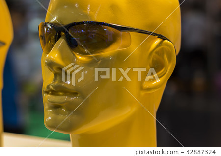 a mannequins with a safety glasses a mannequins with a safety glasses 32887324