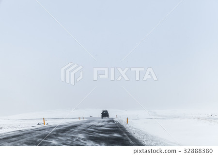 Icelandic road covered with snow, winter Icelandic road covered with snow, winter 32888380