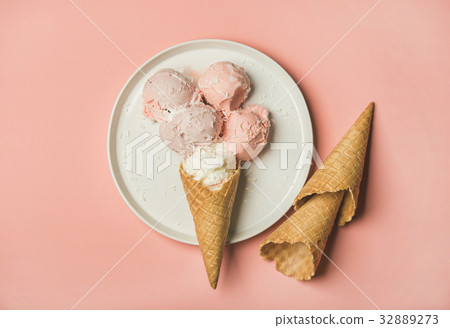 Pink strawberry and coconut ice cream scoops and 32889273