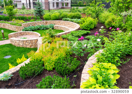 Natural landscaping in home garden Natural landscaping in home garden 32890059