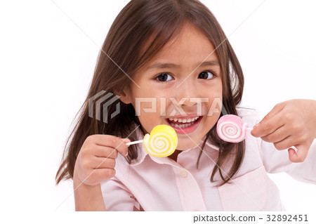 cute little girl eating sugar jelly sweet candy cute little girl eating sugar jelly sweet candy 32892451