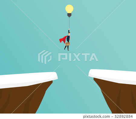 businessman flying with bulb between cliff 32892884