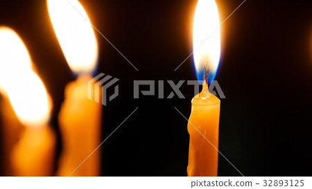 Burning candles in Holy Sepulcher Church 32893125