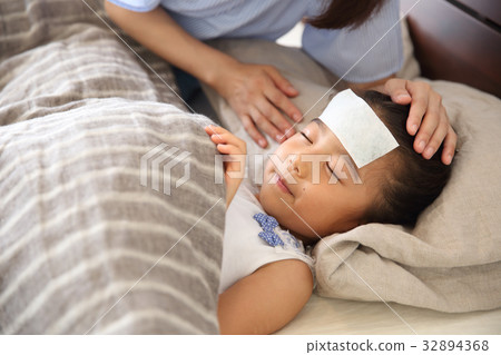 Toddler sleeping in bed Toddler sleeping in bed 32894368