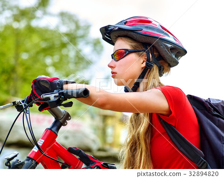 Woman traveling bicycle summer park. Girl with Woman traveling bicycle summer park. Girl with 32894820