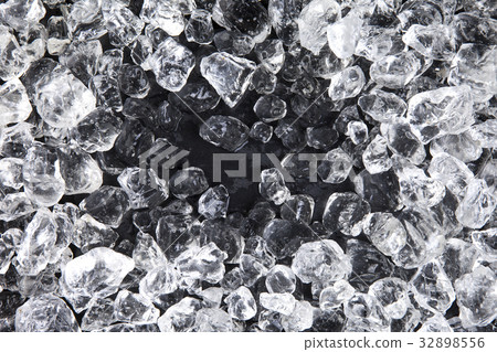 Crushed ice on black background. Top view 32898556