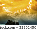The sky with the sun shines through 32902450