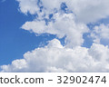 White clouds and bright blue sky background 32902474