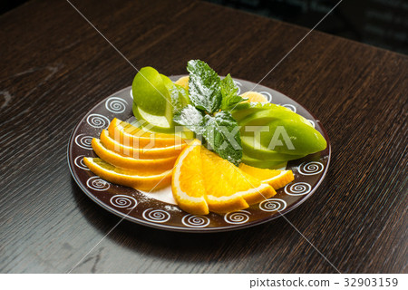 Vegan breakfast: variety of fruits, nuts and Vegan breakfast: variety of fruits, nuts and 32903159