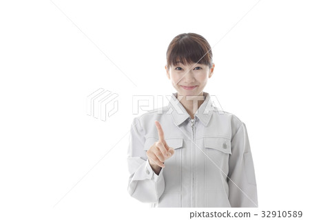 A woman with a pointing pose A woman with a pointing pose 32910589