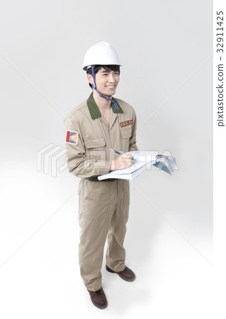 Architects, helmets, blueprints 32911425