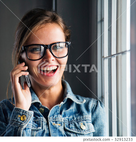 Business woman with a phone 32913233
