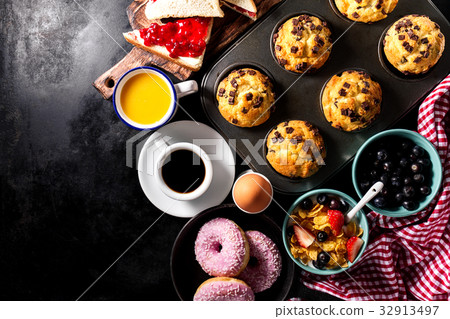 Tasty fresh breakfast food ingredients on black Tasty fresh breakfast food ingredients on black 32913497