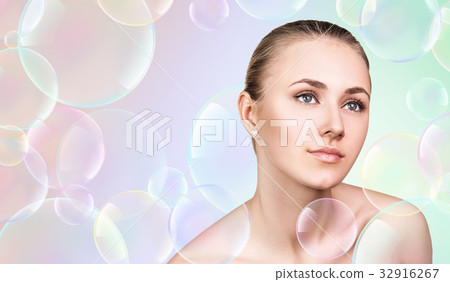 Beautiful sensual woman in soap bubbles. 32916267
