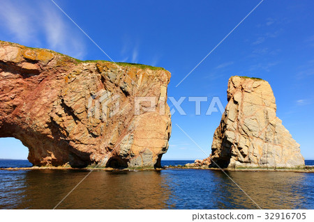 Close up view of Perce Rock at high tide 32916705