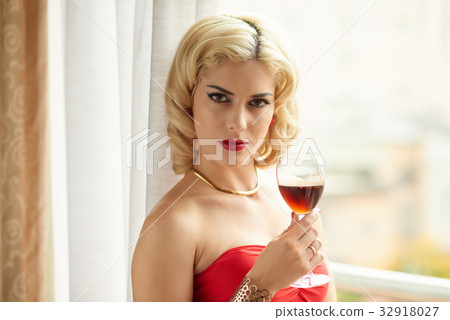 Having glass of wine Having glass of wine 32918027