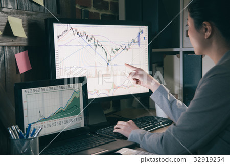glasses lady in suit sitting computer 32919254