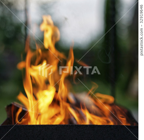 The fire in the grill. The fire in the grill. 32919646