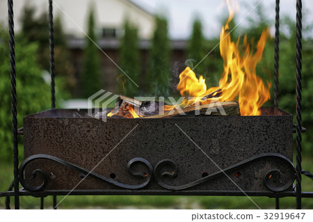 The fire in the grill. The fire in the grill. 32919647