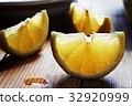 Fresh lemon on a wooden table 32920999