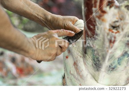 Butcher disassembles carcass of young veal, work Butcher disassembles carcass of young veal, work 32922273