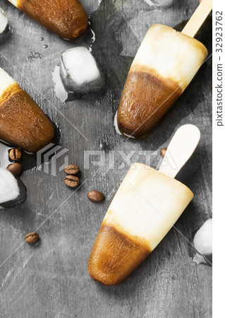 Coffee ice cream popsicles on a dark background Coffee ice cream popsicles on a dark background 32923762