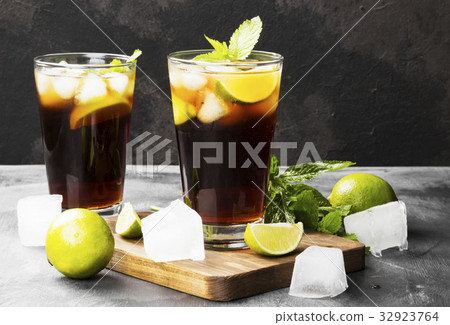 Two glasses of cocktail Cuba Libre Two glasses of cocktail Cuba Libre 32923764