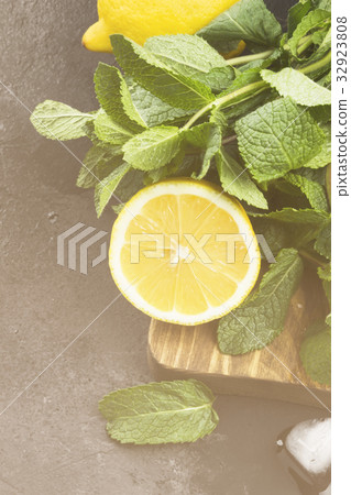 Ingredients for lemonade - lemon, mint, ice Ingredients for lemonade - lemon, mint, ice 32923808