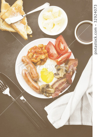 Traditional English breakfast - bacon, sausages 32924073