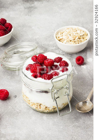 Glanola in glass jar with raspberry and mint Glanola in glass jar with raspberry and mint 32924166