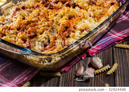 Casserole fusilli pasta with sausage and cheese 32924496