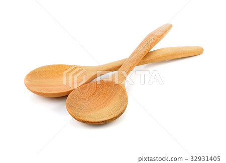 Wooden spoon on white background 32931405