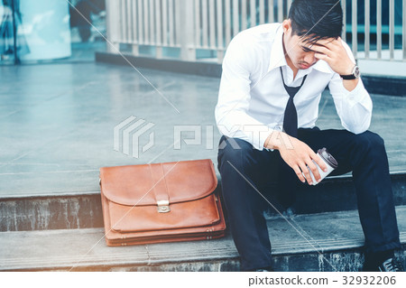 Tired or stressed businessman 32932206