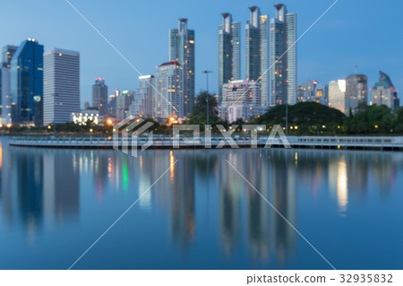 Blurred bokeh light office building with reflect 32935832