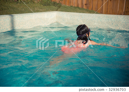 young little girl swimming in hotel young little girl swimming in hotel 32936703
