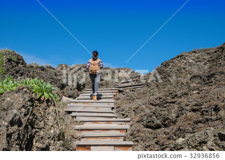 clearly blue sky with female backpacker clearly blue sky with female backpacker 32936856