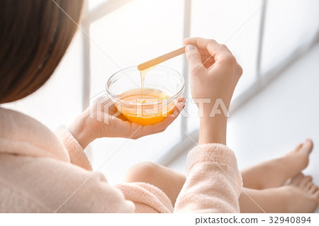 Young woman body care at home indoors Young woman body care at home indoors 32940894