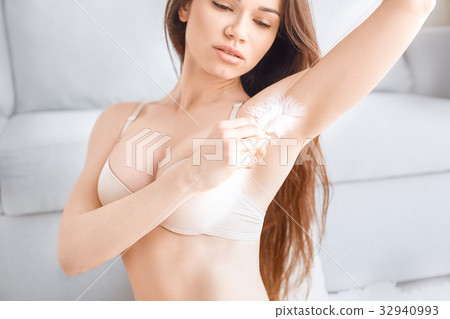 Young woman body care at home indoors 32940993