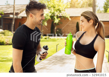 Young couple exercise together outdoors healthy 32941015