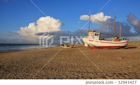 Fishing boat on the shore of the Jammerbugten 32943427