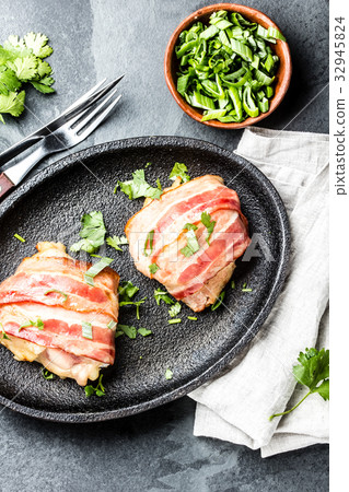 Chicken wrapped in bacon. Top view 32945824