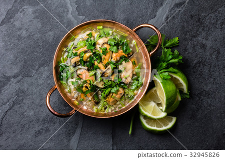 Peruvian food. Mussels ceviche. Cold soup with 32945826